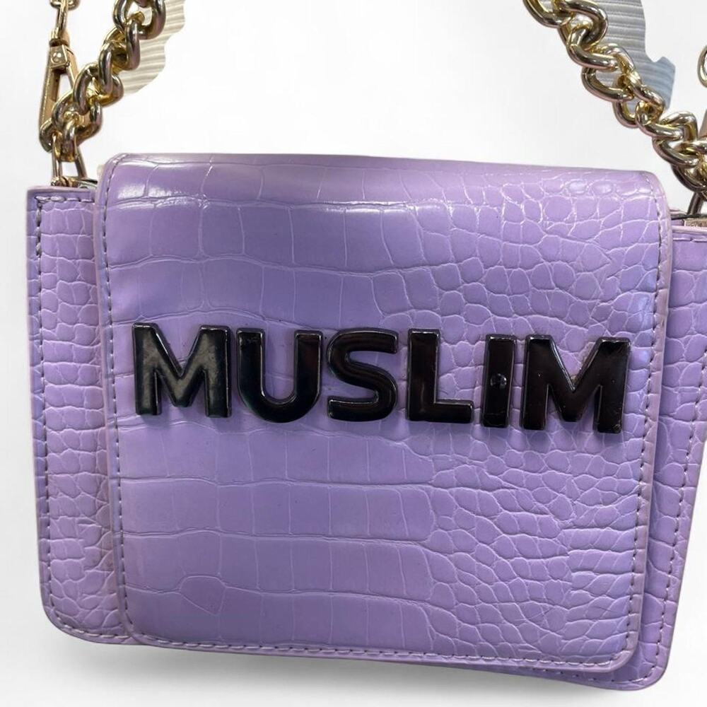 Purple crocodile textured crossbody bag